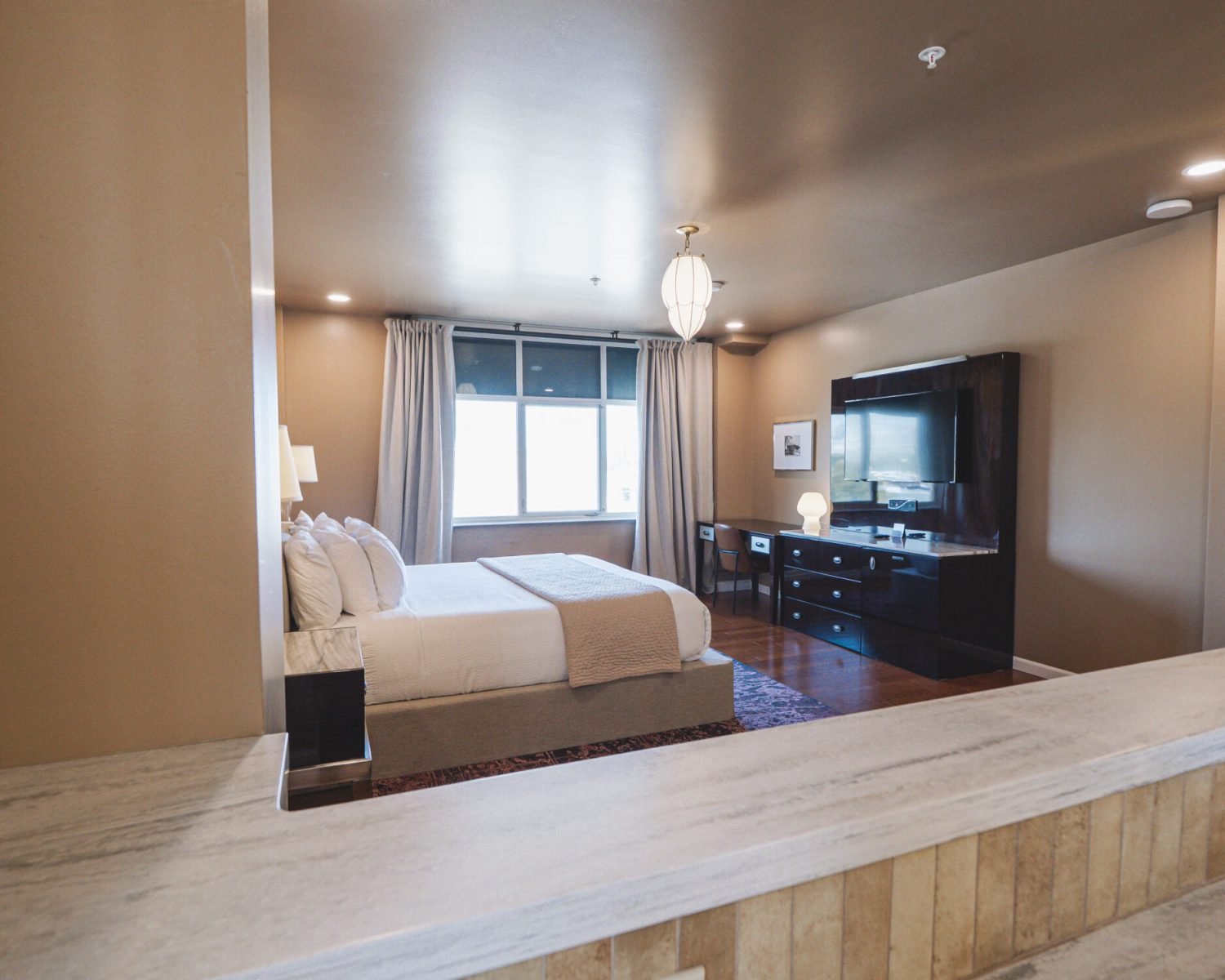 the-abbott-suite-bedroom-view-from-kitchen-counter-powerhouse-on-broadway